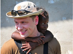 The new identify-verification technology being developed by CCICADA and its partners will speed disaster-relief response times following natural disasters and terrorist attacks. In this photo, a US Navy sailor carries a child during a multi-national response to the 2010 earthquake that flattened Haiti. Photo credit: Flickr, Creative Commons, DVIDSHUB